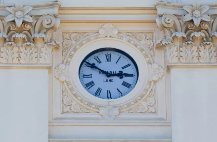 The clock at the front of the Main University Building