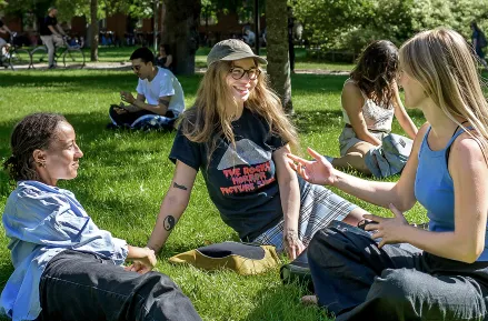 Students in the park. Photo.