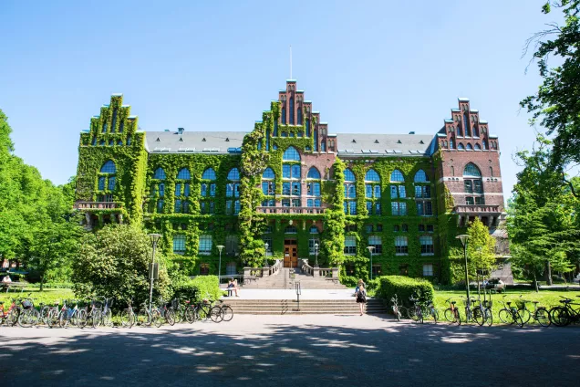 The Main University Library covered in green leafs and blue flowers 