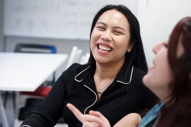 Students laughing in a classroom. Photo: Johan Bävman. 