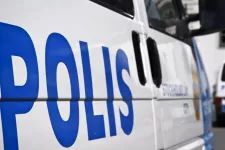 Close-up of police logo on a police car