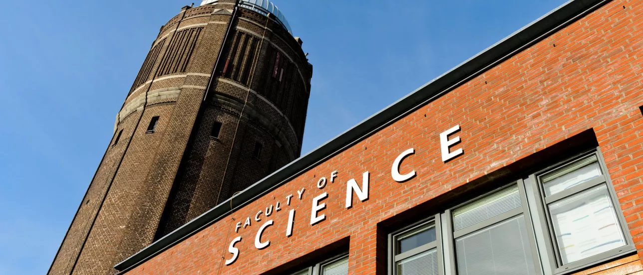 The old water tower with a name sign saying Faculty of Science