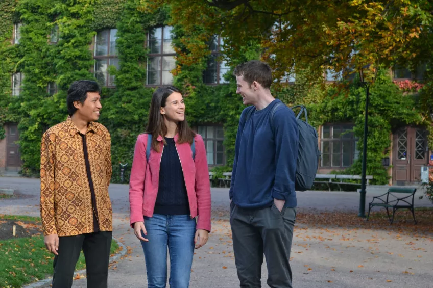 Students talking in front of Palaestra